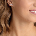 Swarovski - Lifelong Bow Pierced Earrings, White, Rhodium plated